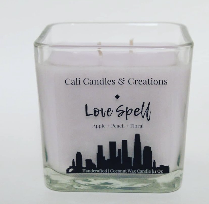Love Spell coconut wax candle in a square glass jar